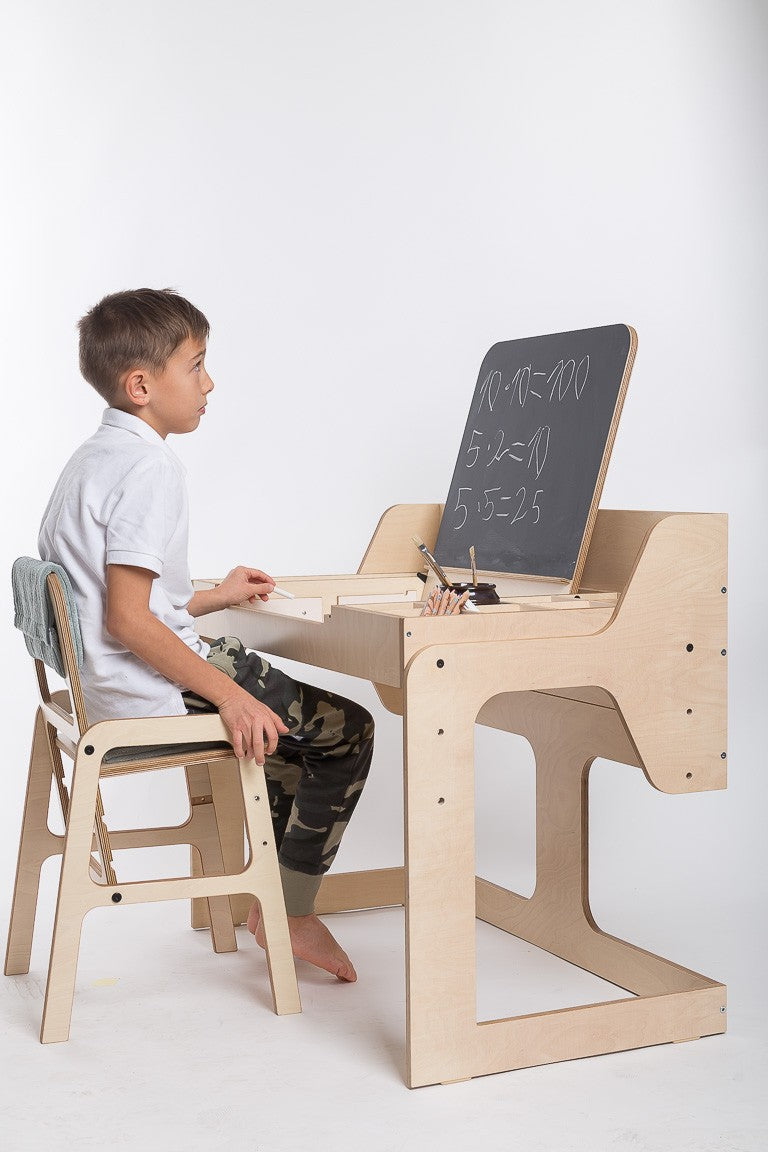a playful mint green kids chair with a low armrest in a sunlit playroom