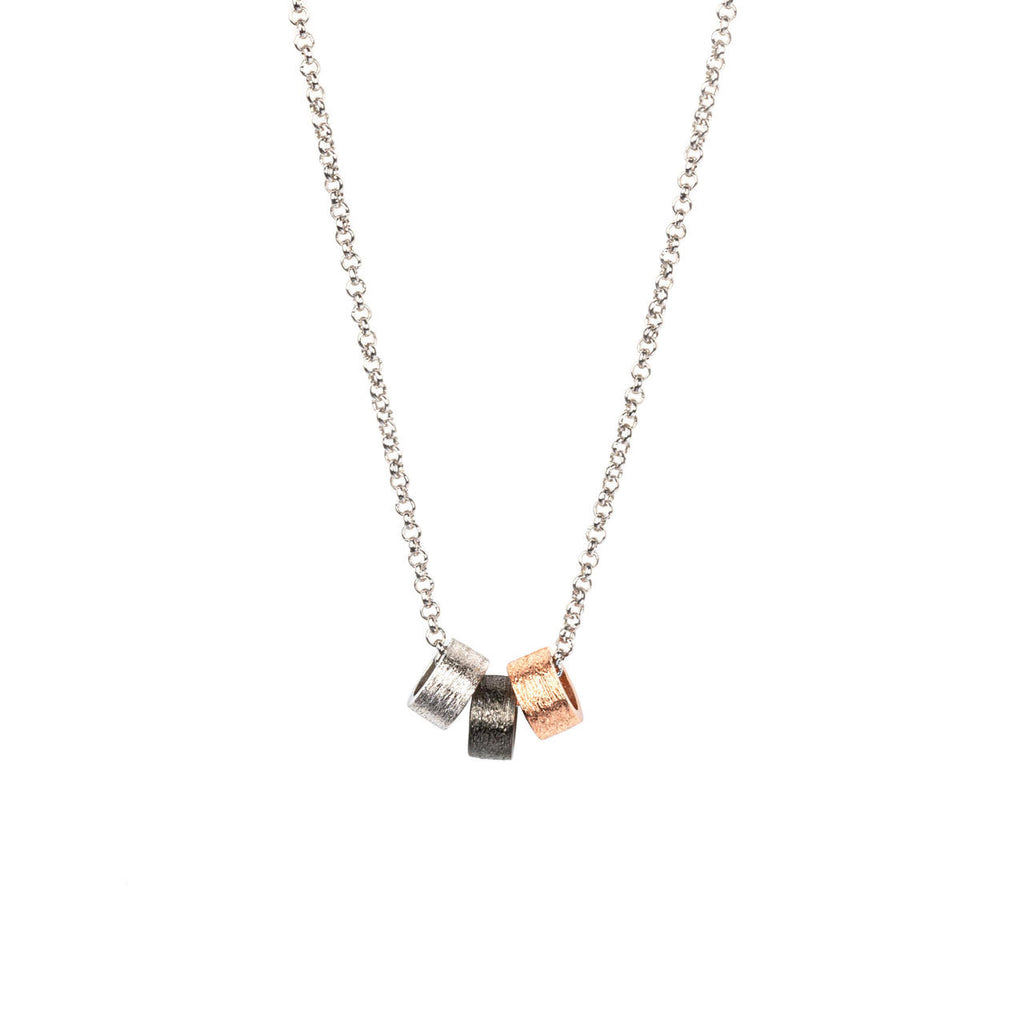 bold close-up of the airy dots choker in dramatic lighting, showcasing its elegant 925 silver and rose gold plating