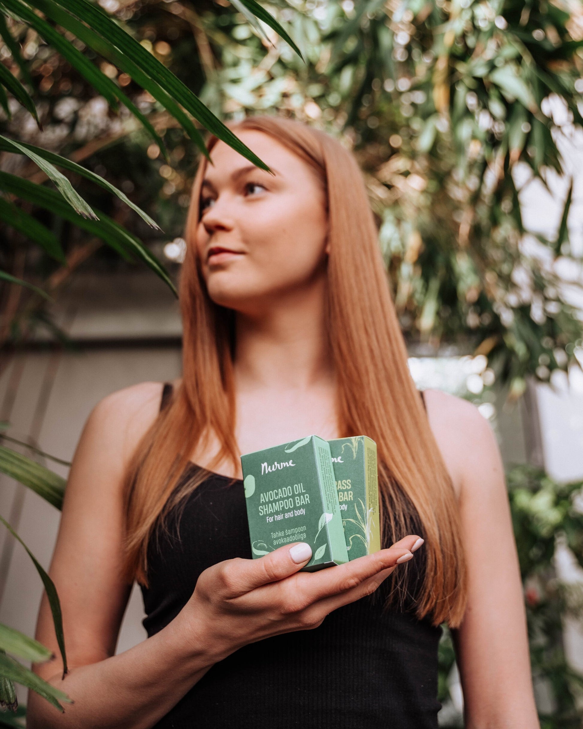 softly lit avocado oil shampoo bar resting on a natural linen cloth, radiating gentle nourishment