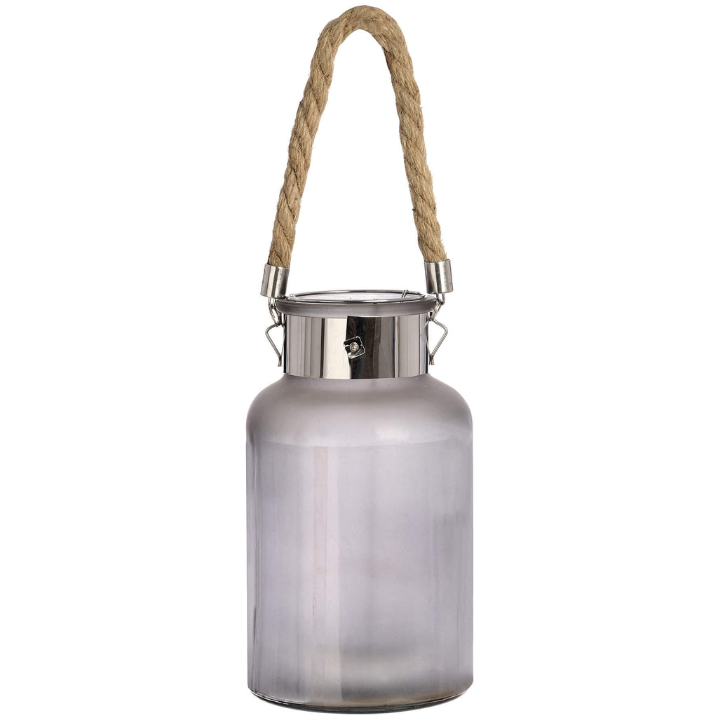 Frosted grey glass lantern with rope handle and warm LED glow, creating a starlight effect for indoor or outdoor decor. by RoomLondon at brixbailey.com