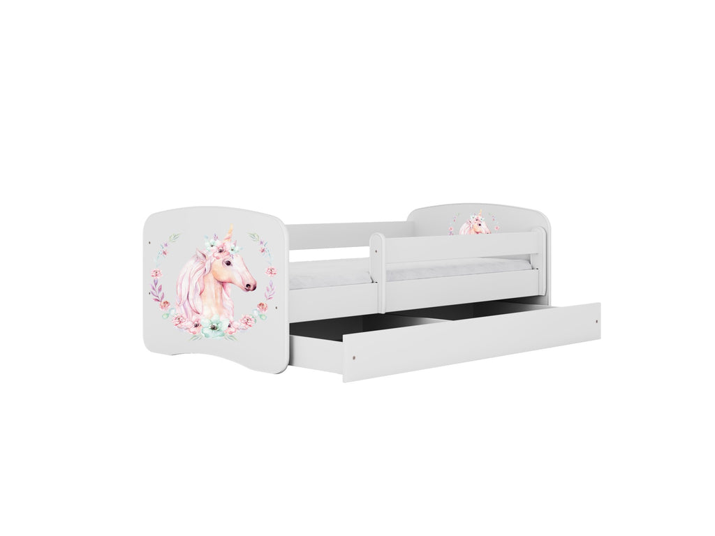 a playful close-up of the dreamy unicorn bed's pink horn and mane, glowing in warm, fun bedroom light