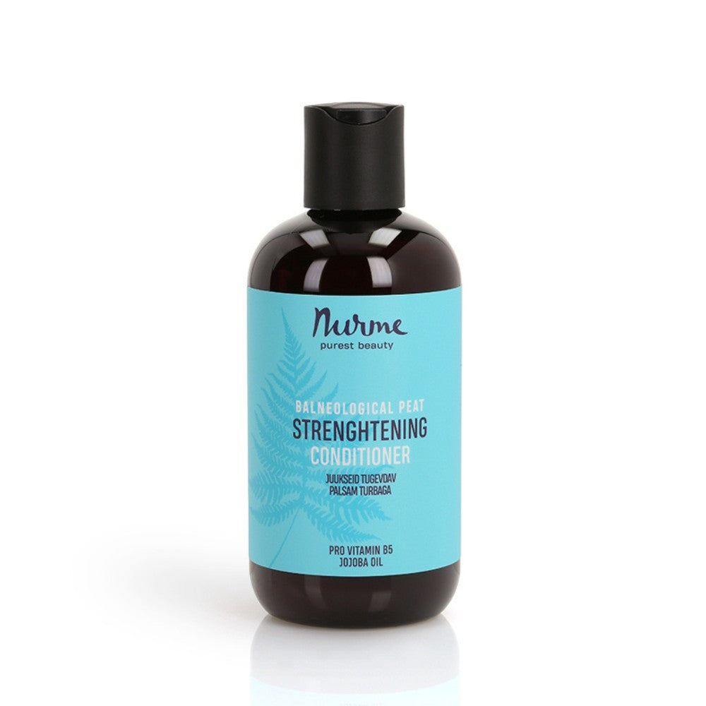 bold close-up of nurme peat conditioner bottle with rich texture and natural ingredients