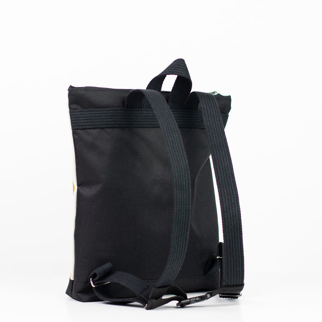 Striped Mustard Backpack for Kids – Stylish & Durable Outdoor Gear by Muni at www.brixbailey.com