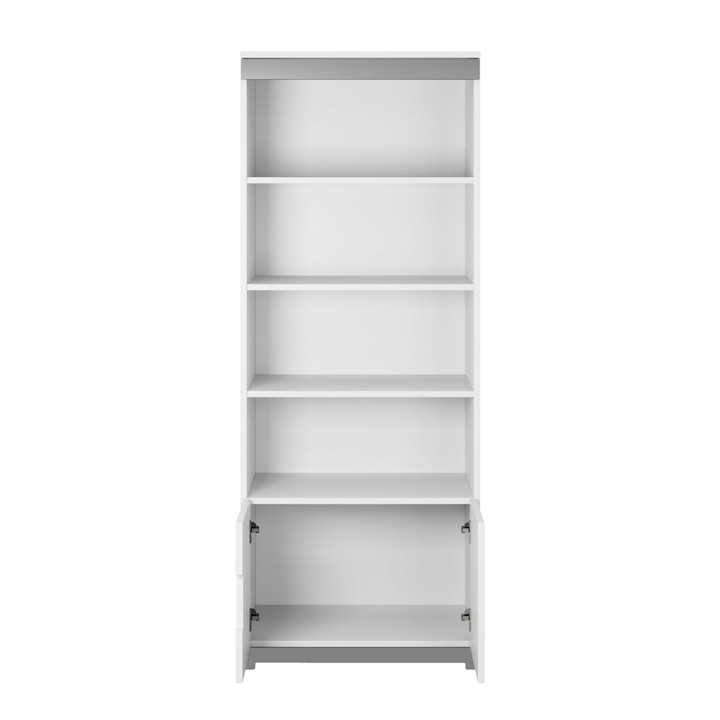 tomi kids bookshelf in a bright nursery with a playful pet nearby