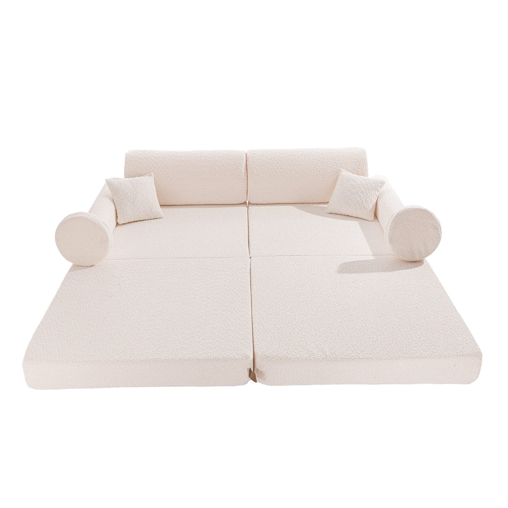 a soft white boucle kids sofa bathed in gentle morning light, looking supremely snuggle-worthy