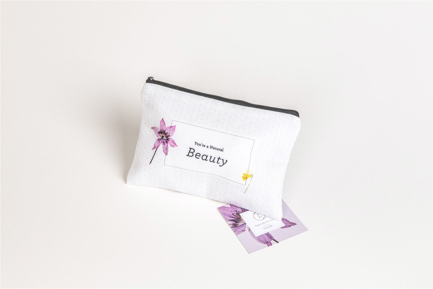 bride-to-be gift set with lavender scrub and soap on a rustic wooden table