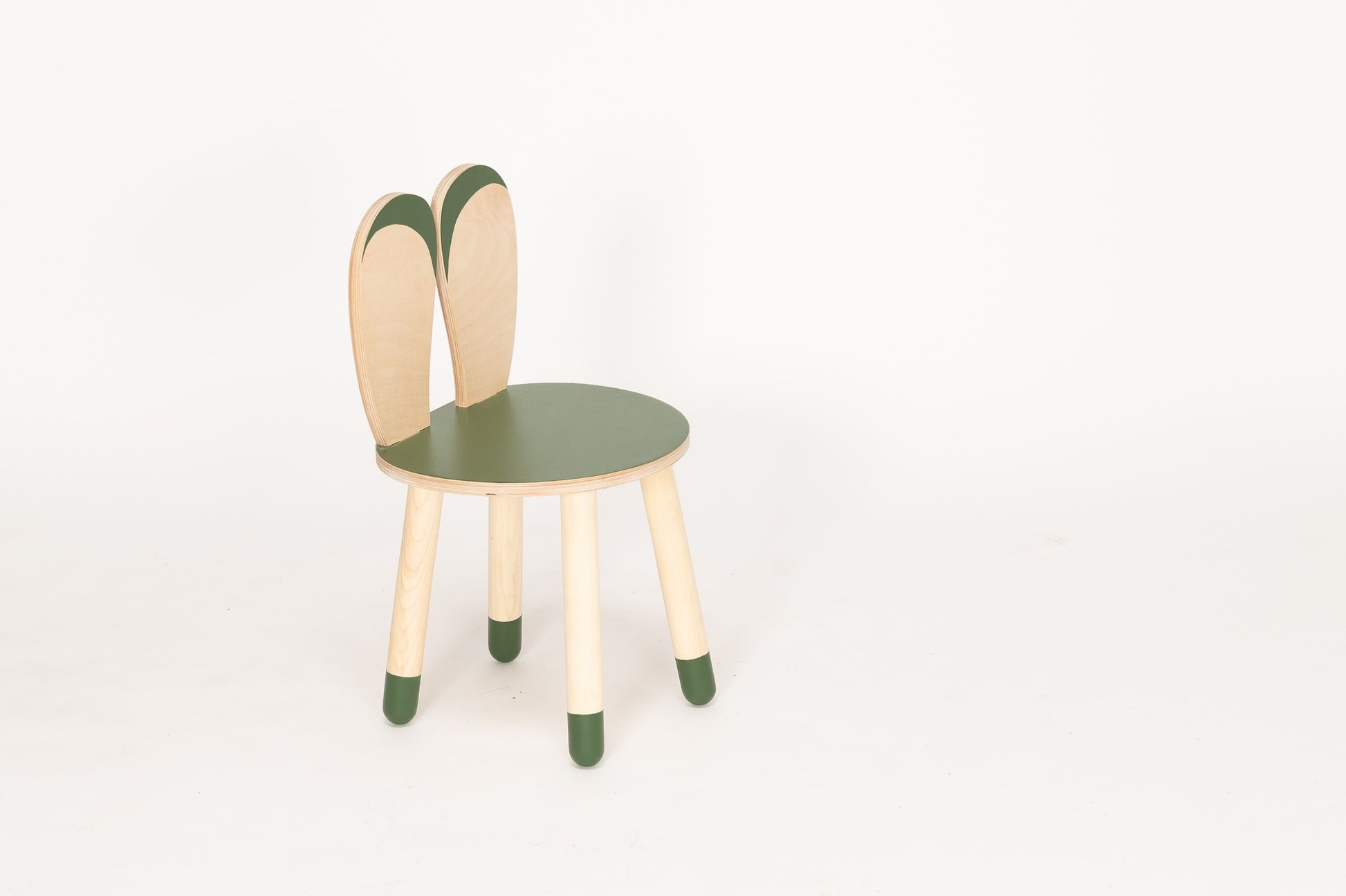 adorable birch plywood bunny chair for kids in a cozy nursery corner