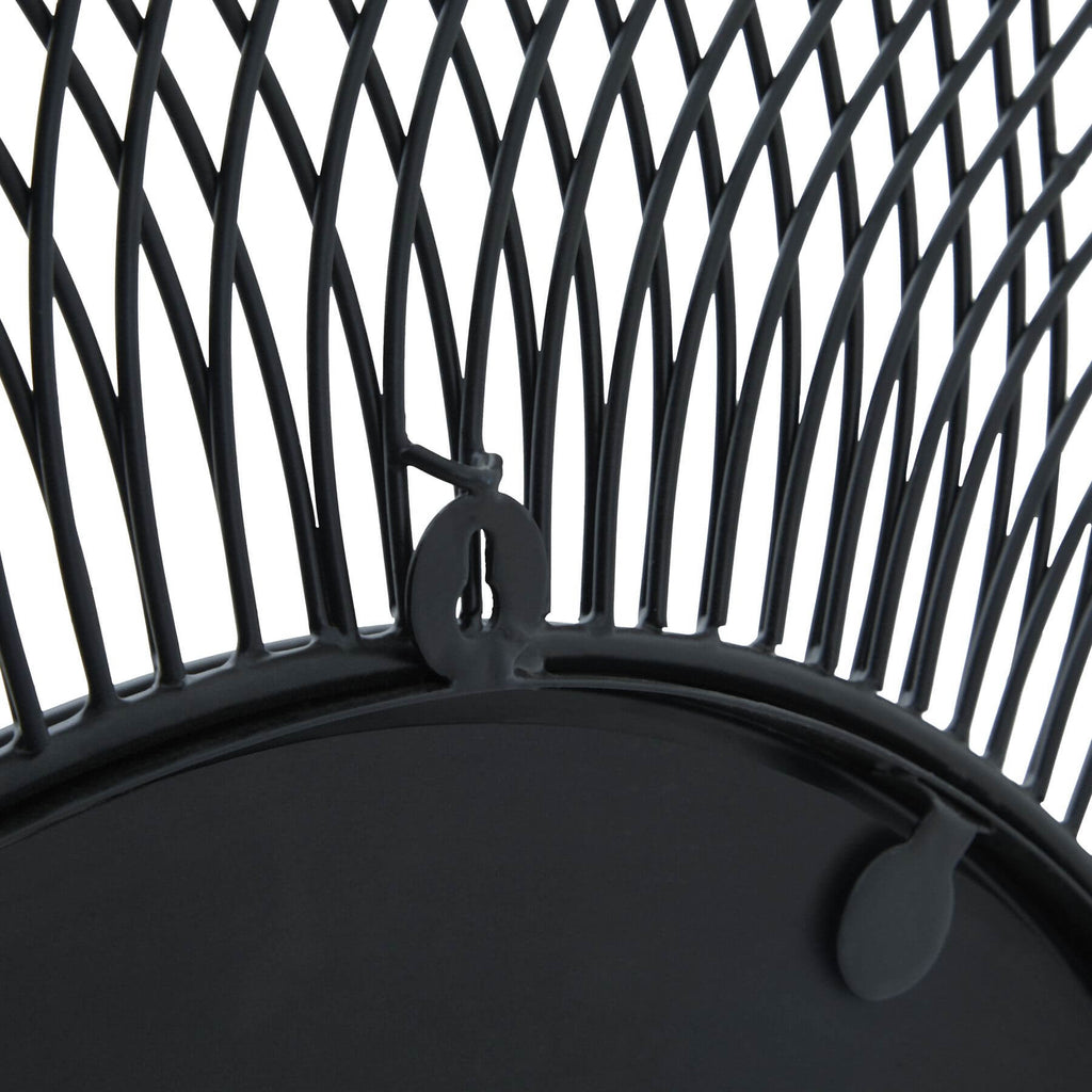 Black geometric wire mirror, 109cm circular industrial design with matte black metal frame and tempered glass. by Sostter at brixbailey.com