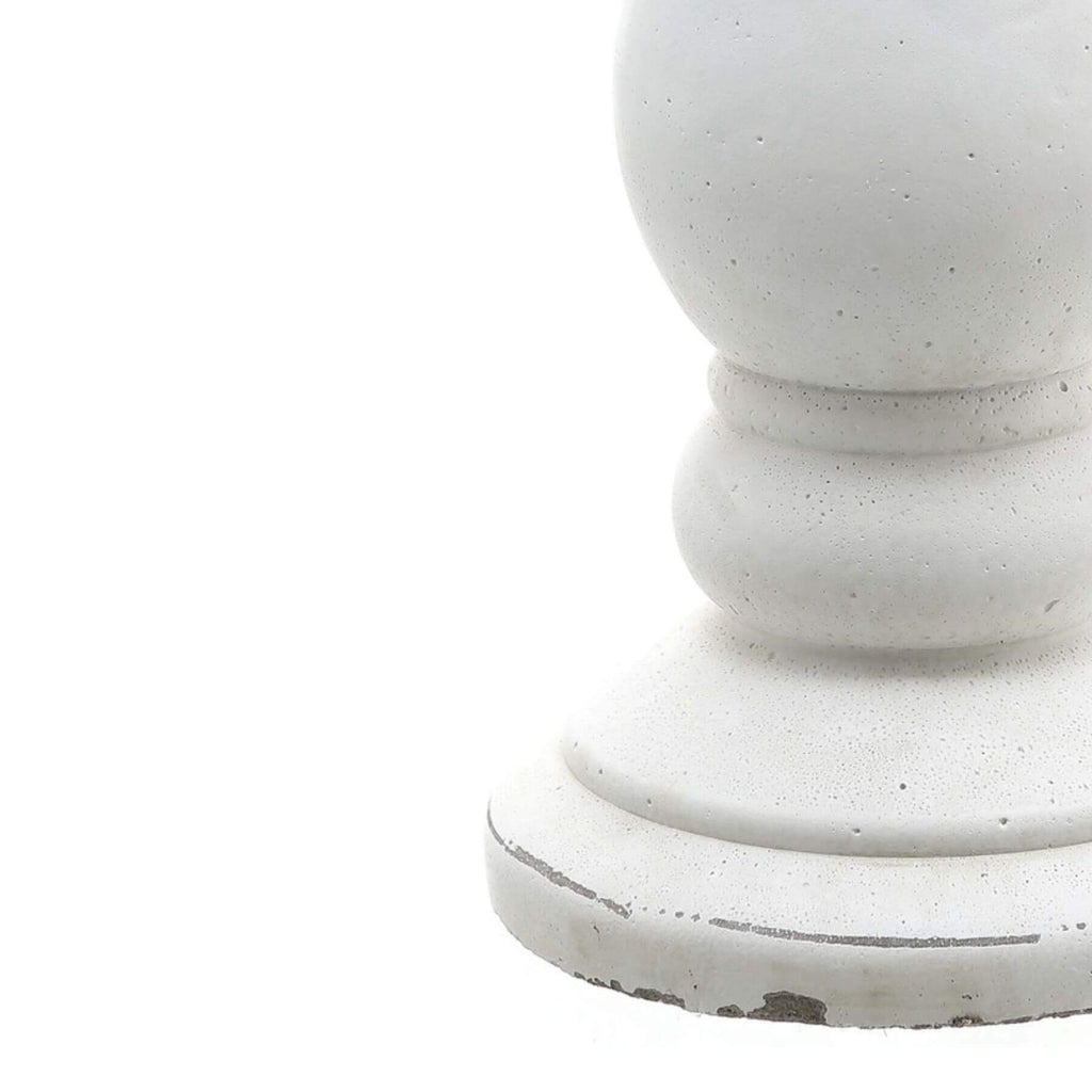 Handcrafted matte white ceramic candle holder with minimalist design for soft light diffusion in home decor by RoomLondon at brixbailey.com