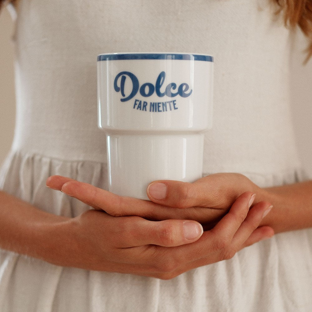 bold italian ceramic mug with terra mamma design held confidently in hand