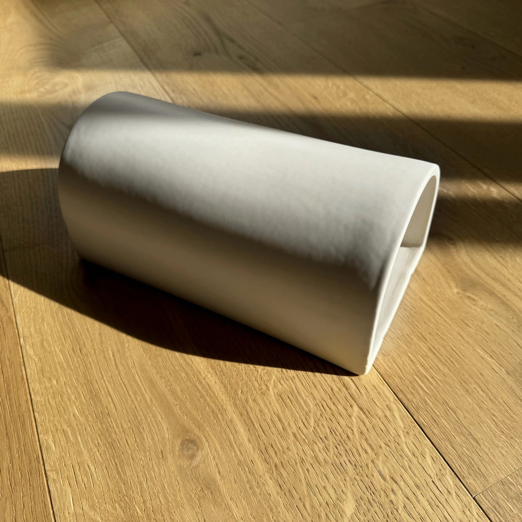 off white ceramic wall light shown with an e27 led bulb for easy installation