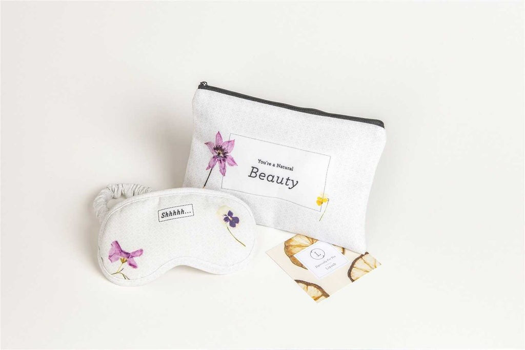 practical layout of citrus cheer up gift basket showing the soap saver and face towel for daily recovery care
