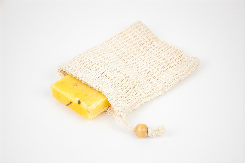 a functional and practical view of the citrus cheer up gift basket's cosmetic bag and face towel for daily organization