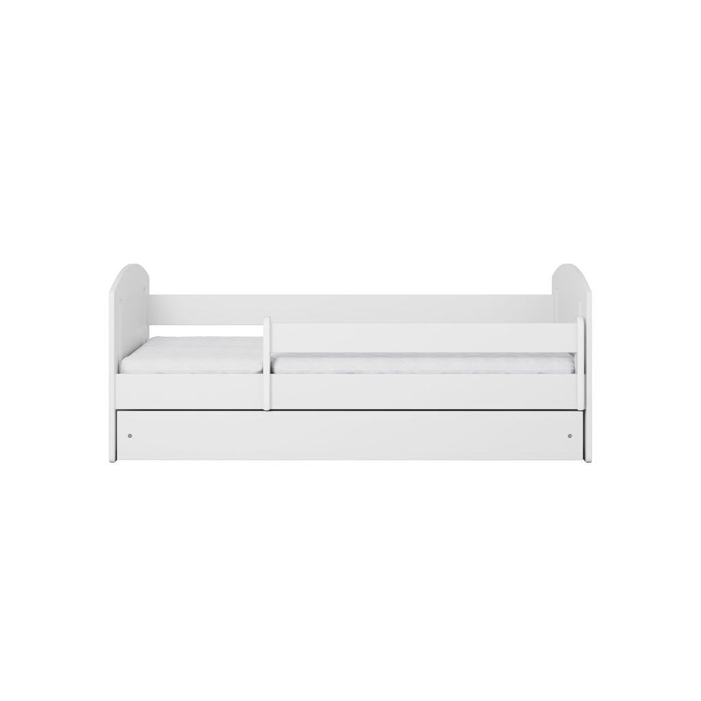 a soft-lit view of a white classic childrens bed with a cozy guardrail and warm wood slats