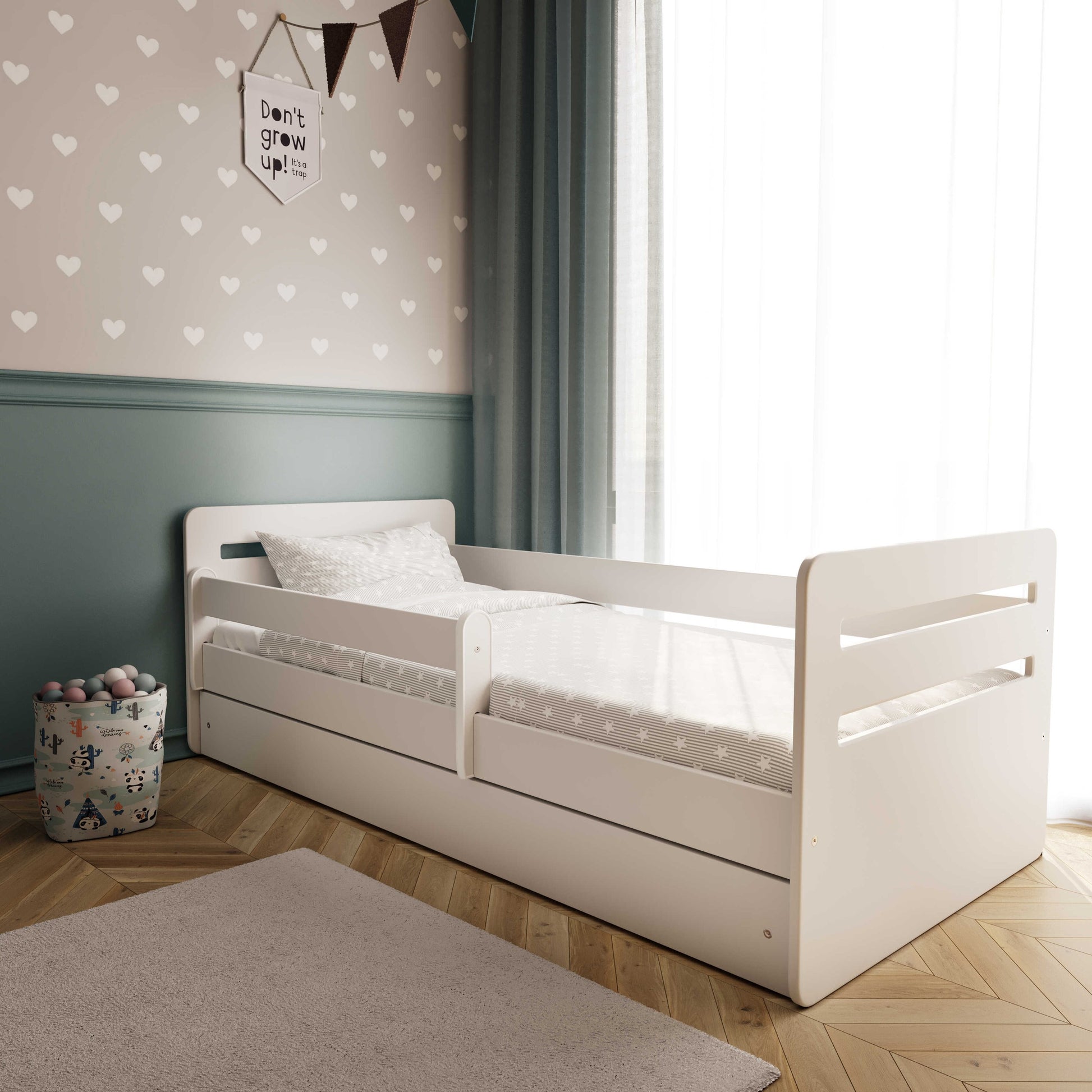 confident front view of the tomi white kids bed with its sleek safety guardrail