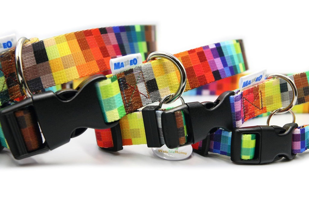 a functional durable pixels dog collar with plastic buckle laid flat on a stone path