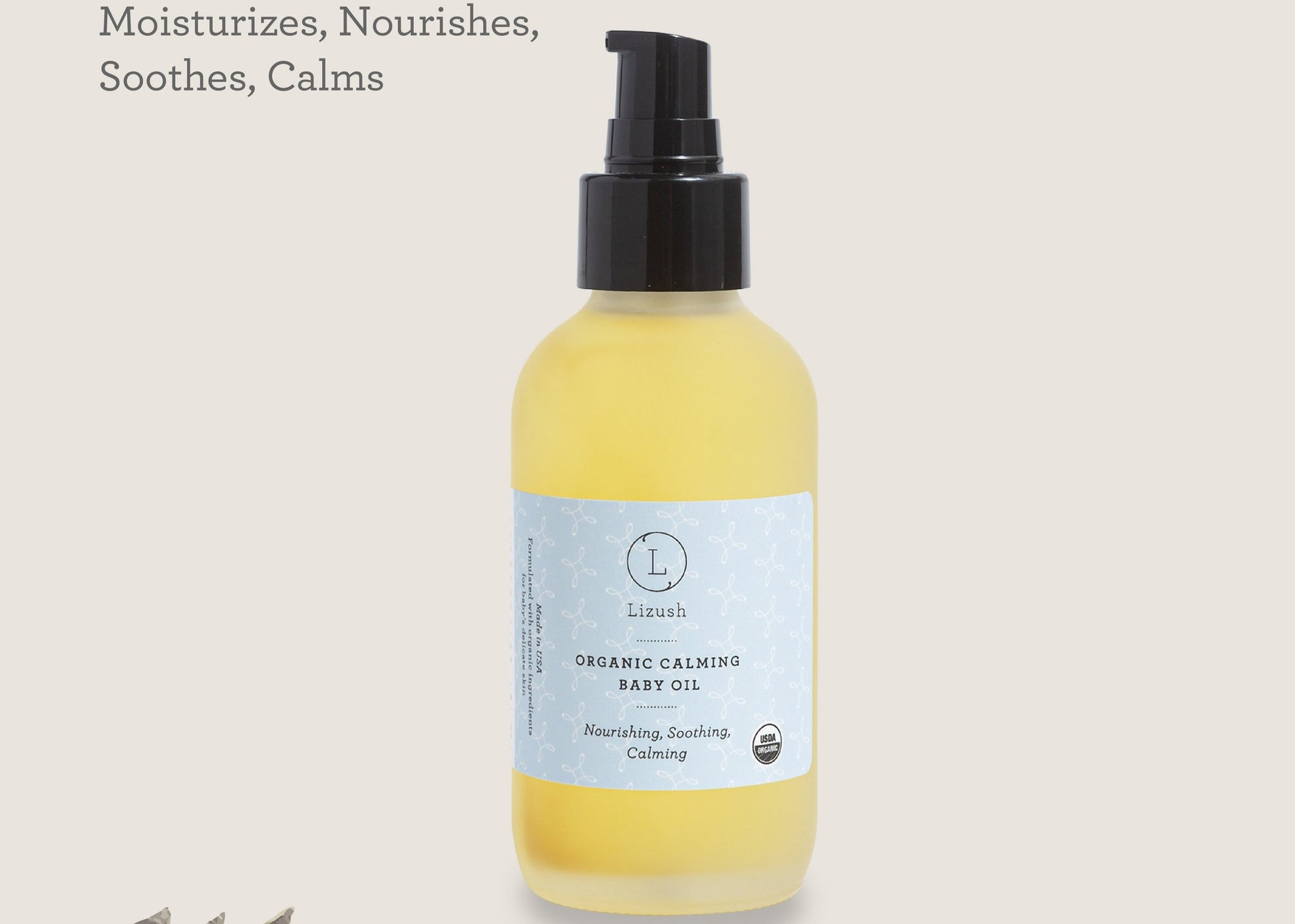bold bottle of organic baby oil with lavender and chamomile for sensitive skin