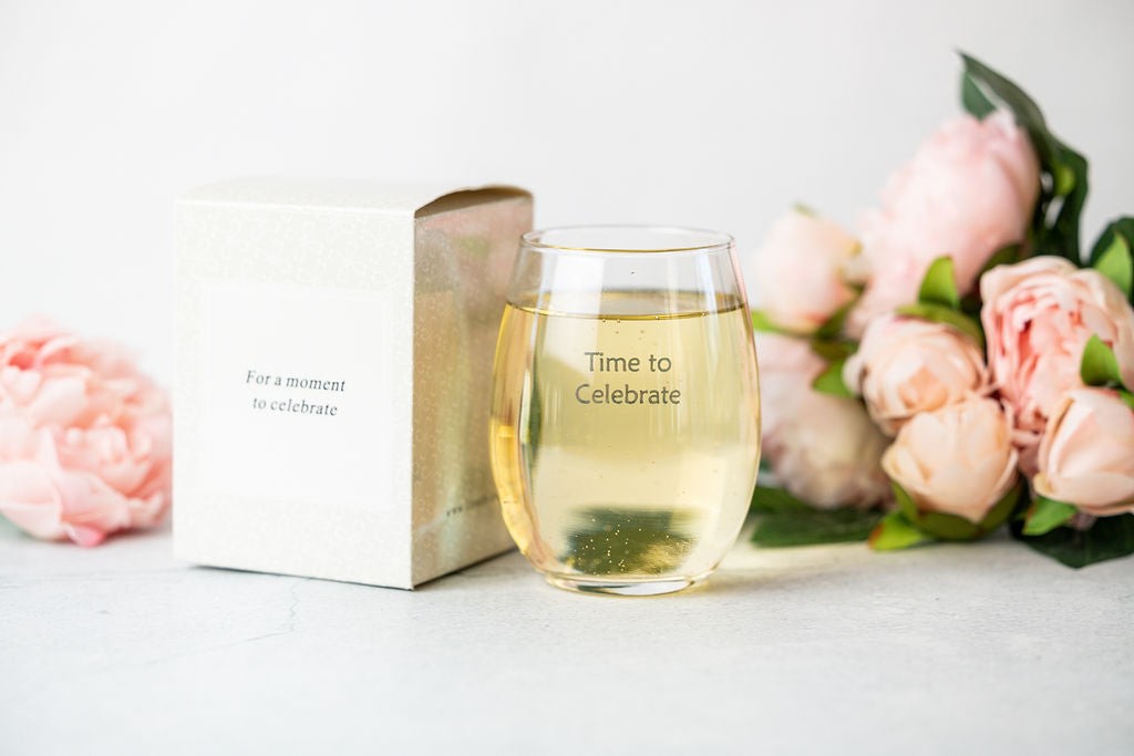a functional and practical arrangement of the 12 celebration gift box essentials laid out on a gray towel