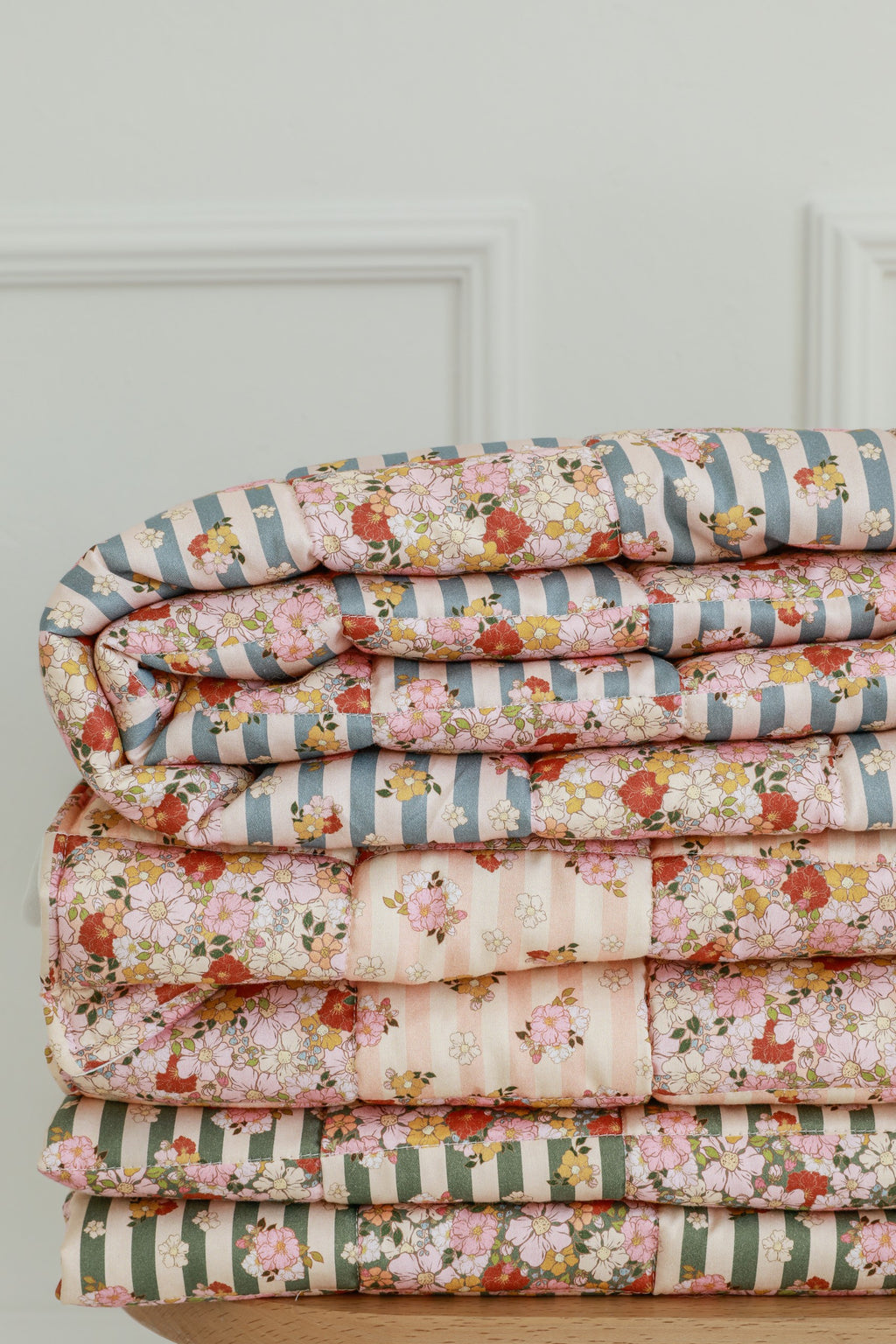 playful summer garden quilted blanket and pillow set with vibrant patchwork patterns, perfect for kids' naps and play