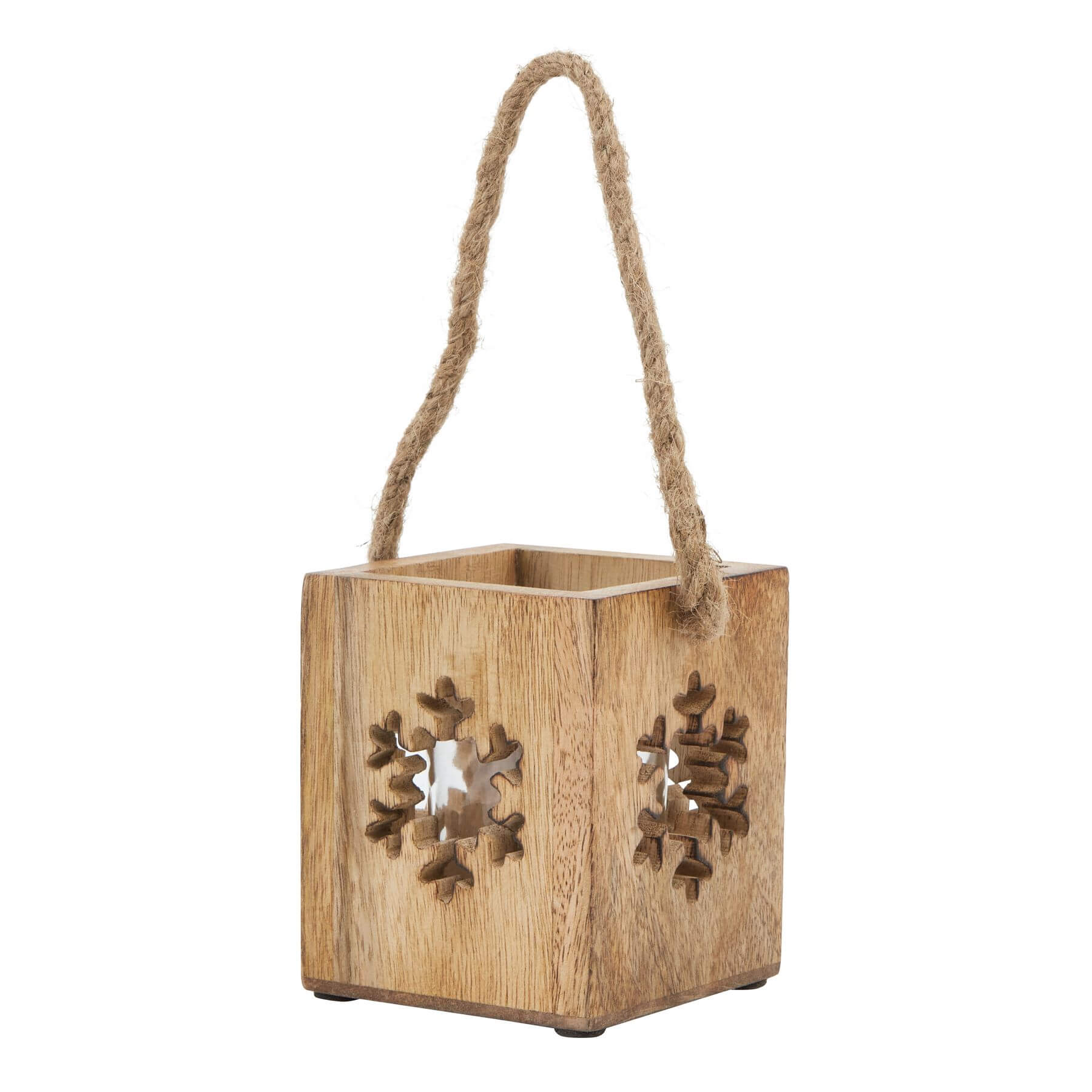 Handcrafted wooden snowflake tealight holder with glass accents, casting warm winter shadows on natural wood. by RoomLondon at brixbailey.com