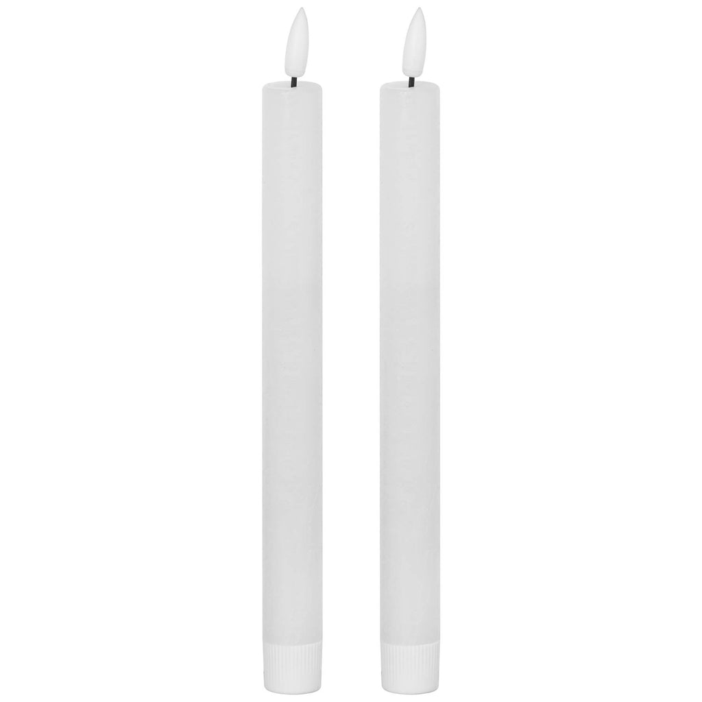 White LED dinner candles with realistic wax texture and flickering flame effect, set of two by RoomLondon at brixbailey.com