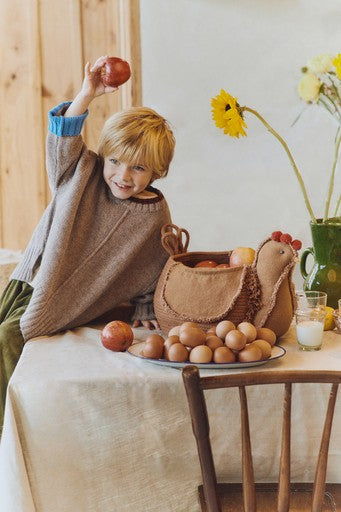 Rustic Charm Hen Pouf: Handcrafted & Functional for Enhancing Cozy Interiors by Lorena Canals at www.brixbailey.com