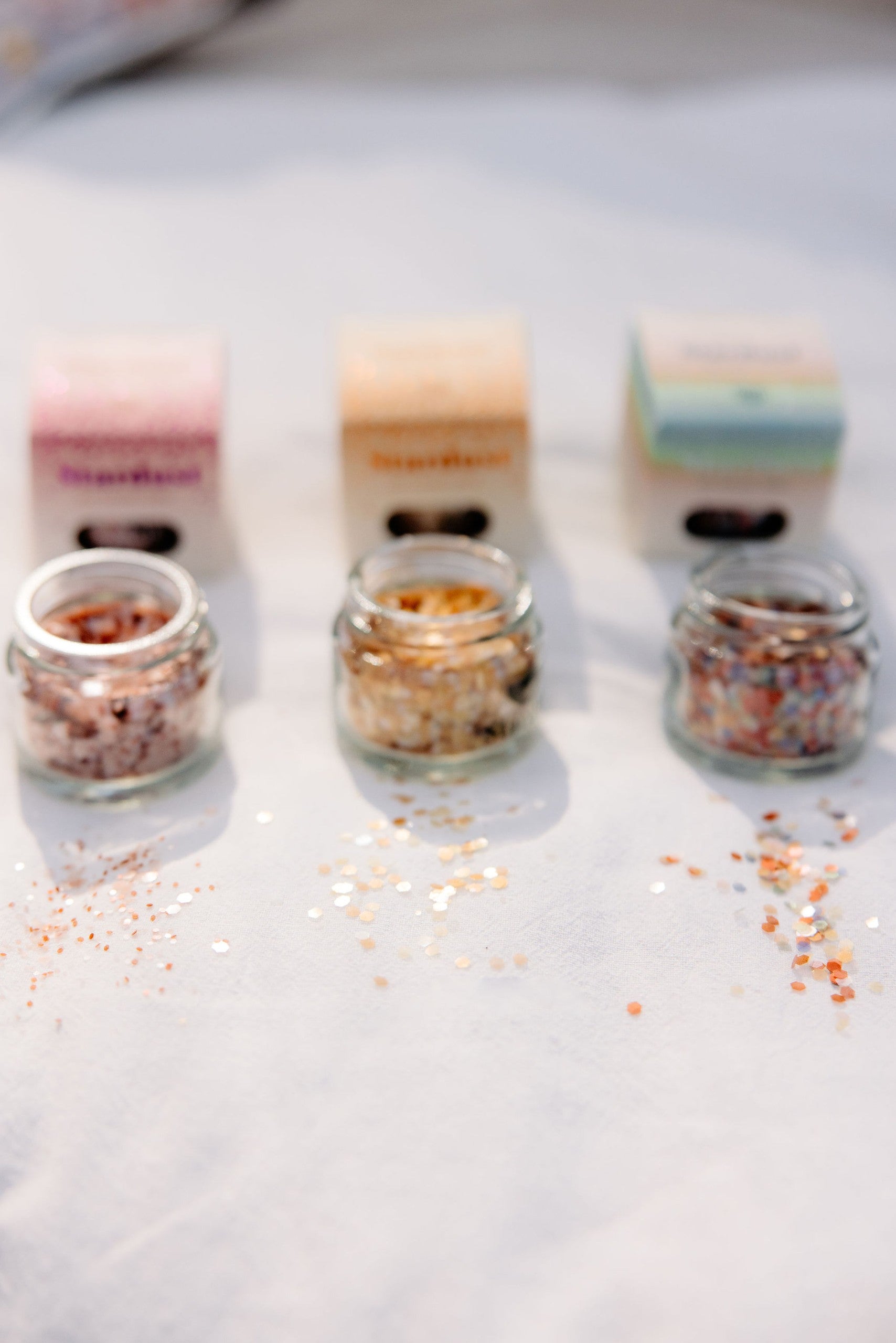 close-up of pink star dust biodegradable glitter sparkling in warm light