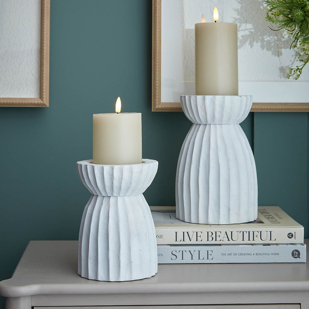 Handcrafted white hurricane lantern with intricate carved patterns, 36cm tall, casting ambient light for home decor. by RoomLondon at brixbailey.com
