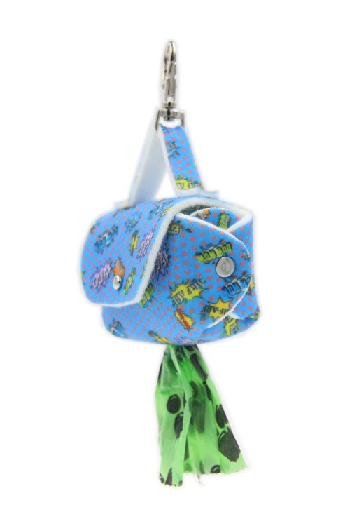 playful blue graffiti dog bag dispenser clipped to a leash on a sunny walk