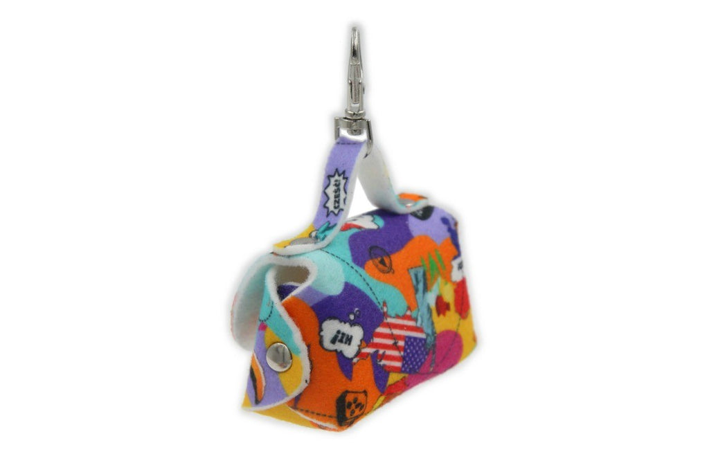 close-up of a felt dog bag dispenser attached to a leash with metal hardware