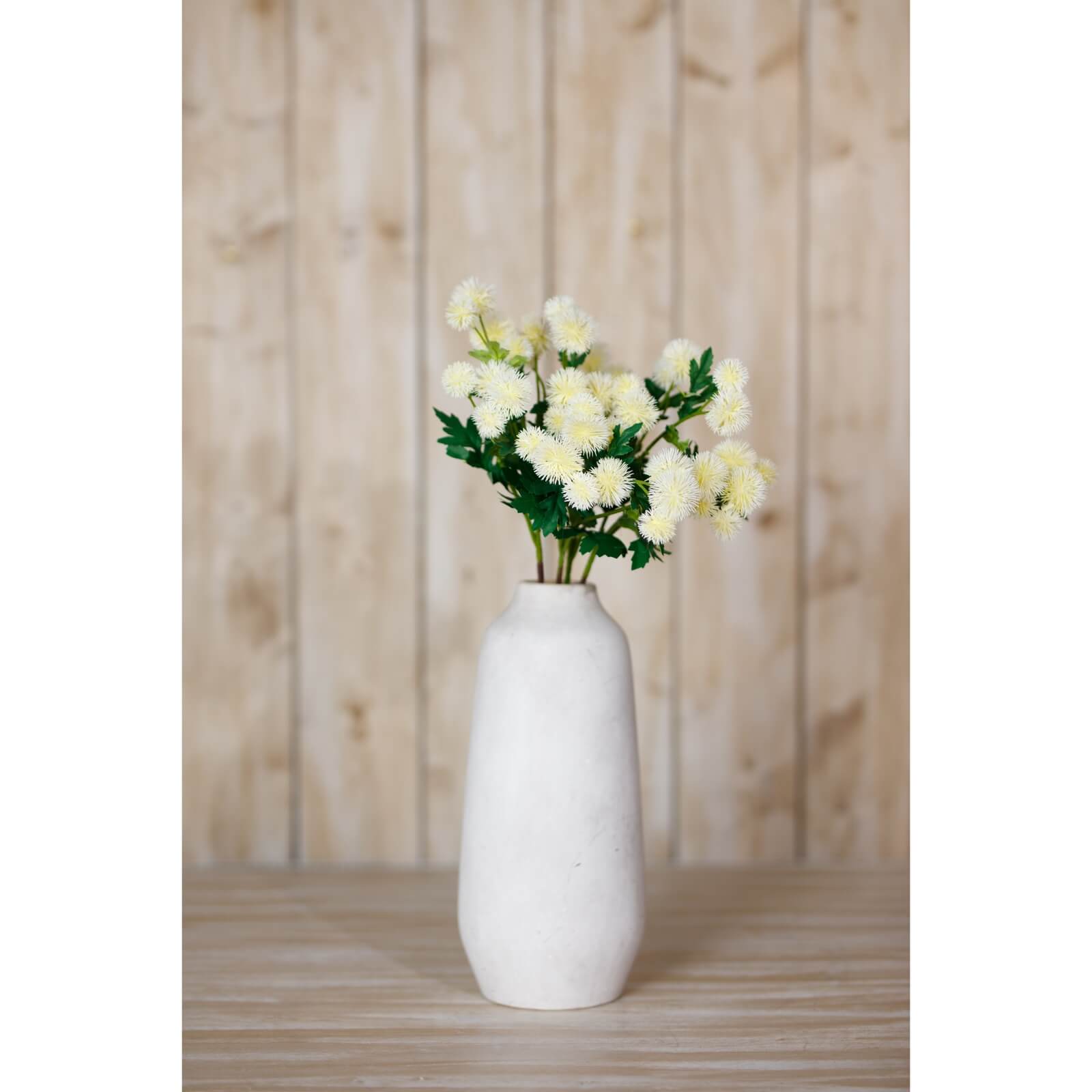 Cream faux globe thistle spray with lifelike texture, 56cm tall, perfect for modern or rustic home decor by Sostter at brixbailey.com