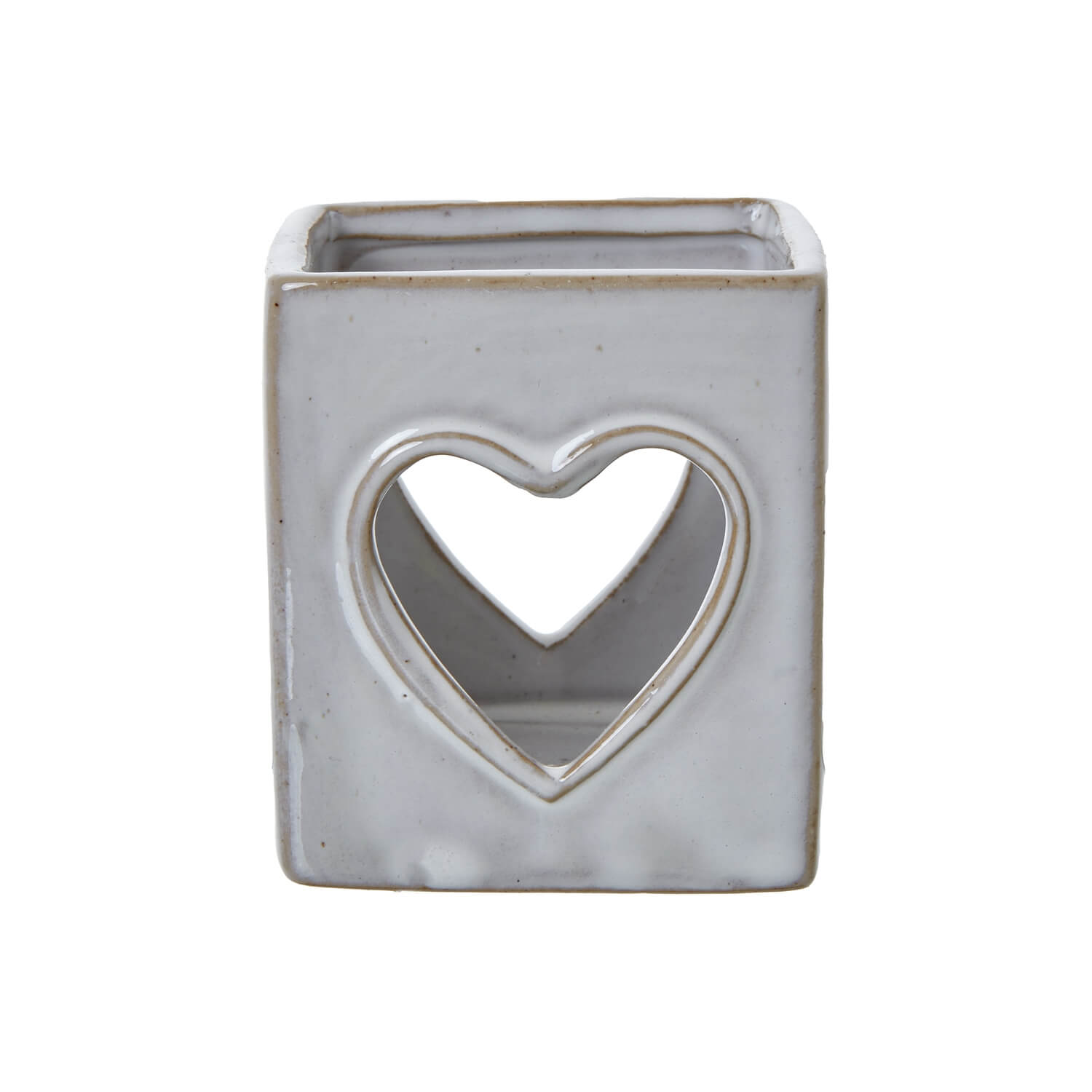 White ceramic tealight holder with heart cutout, Scandinavian minimalist design, projects romantic light patterns. by RoomLondon at brixbailey.com