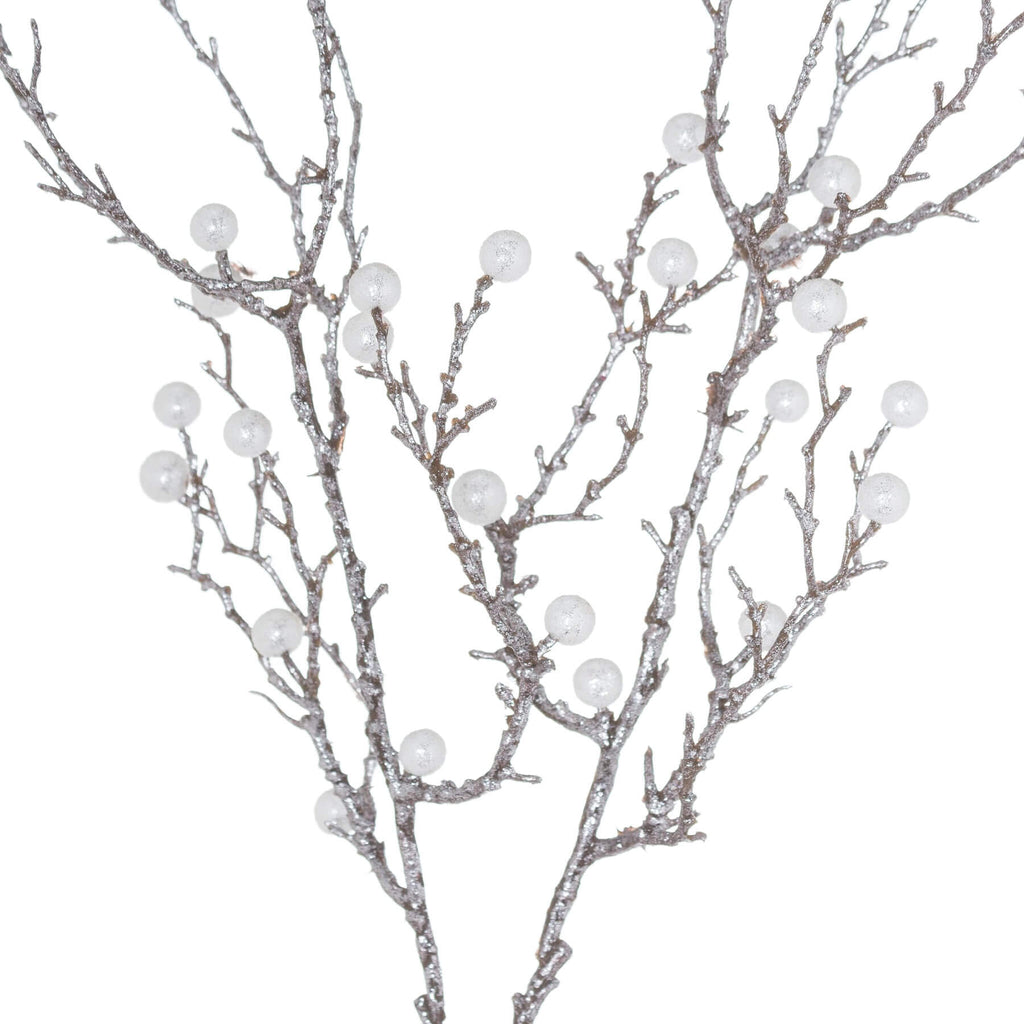 Pearl-finish metallic holiday spray for wreaths and centerpieces, reflecting light with elegant sophistication. by sostter at brixbailey.com