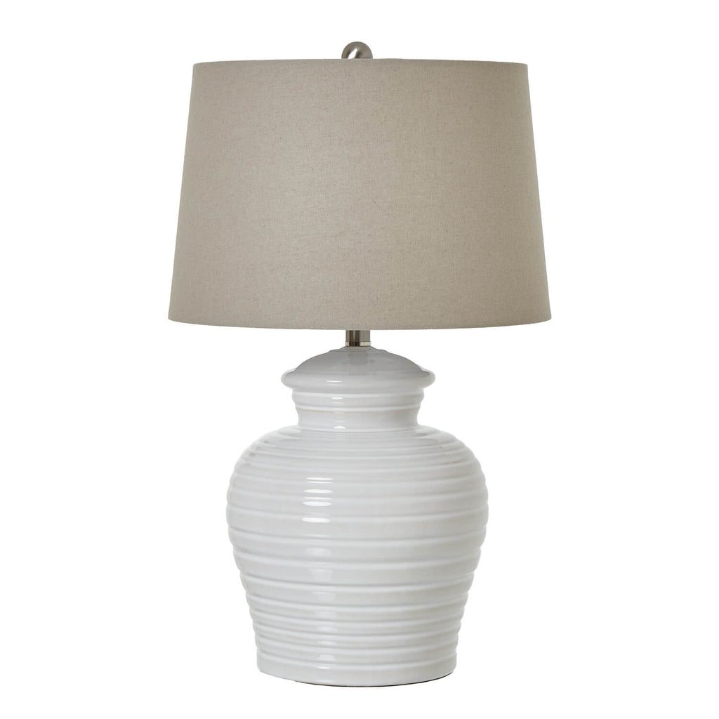 Hand-textured ribbed ceramic table lamp in earthy green with neutral linen shade, 62cm tall, for ambient lighting. by Sostter at brixbailey.com