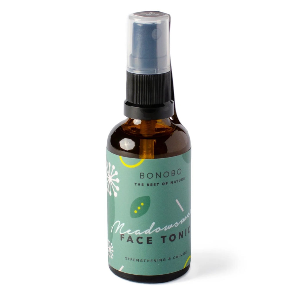 bold close-up of meadowsweet face tonic bottle with fresh dew drops