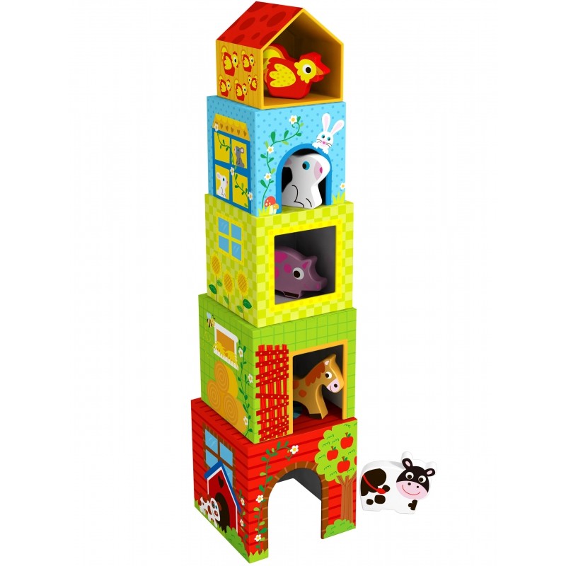 a child's hand placing a wooden cow into its numbered cube on a sunlit wooden table