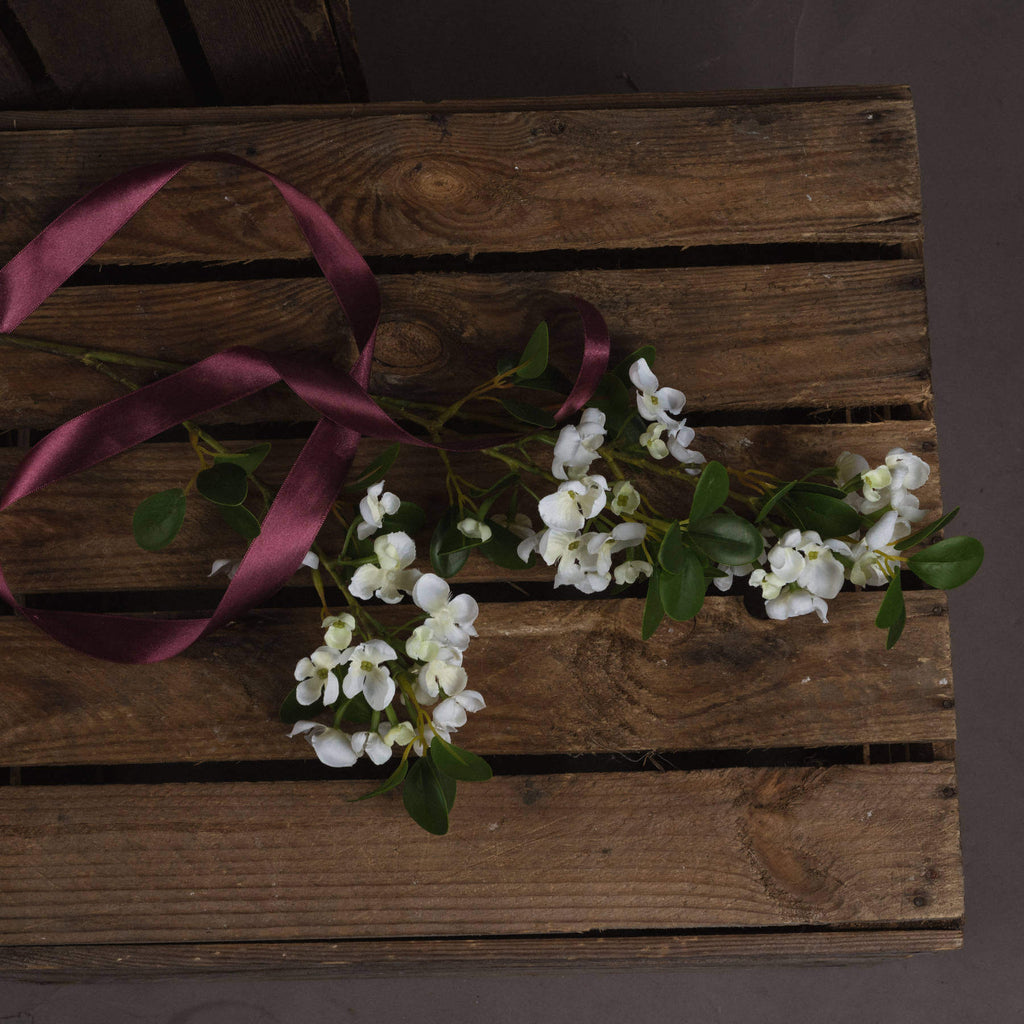 Lifelike white orange blossom spray with realistic petals, perfect for home decor, made of durable premium plastic. by sostter at brixbailey.com