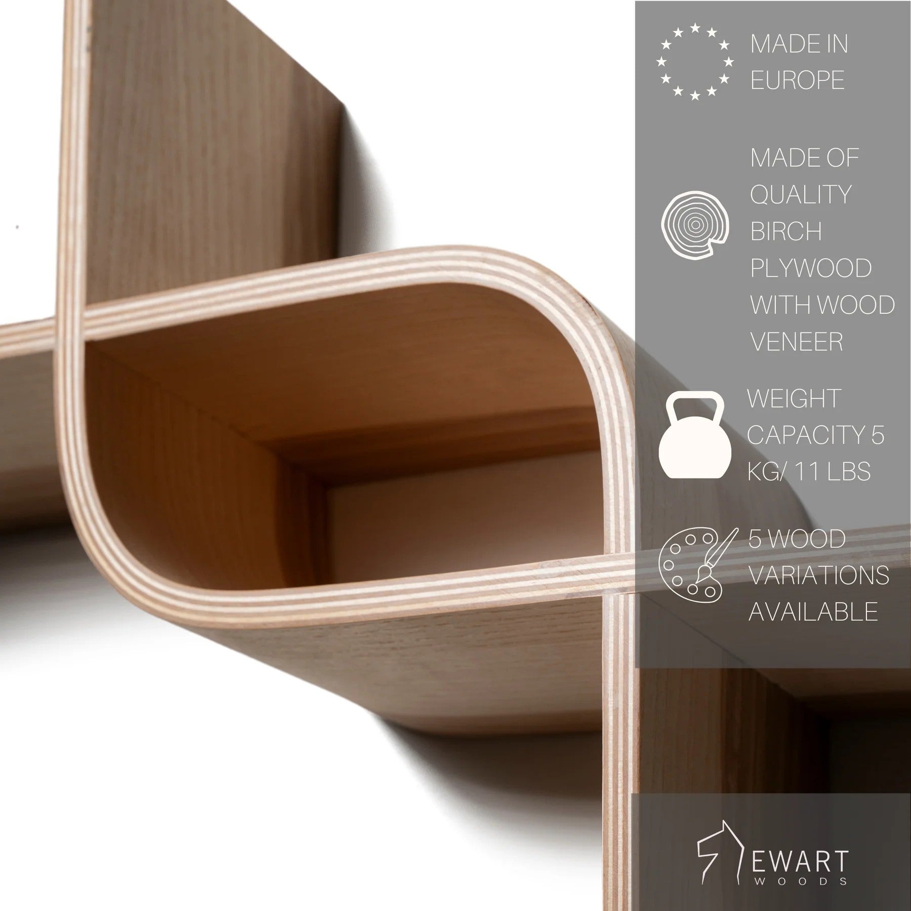 elegant curved floating shelf in a warm cherry finish displayed in a cozy study nook