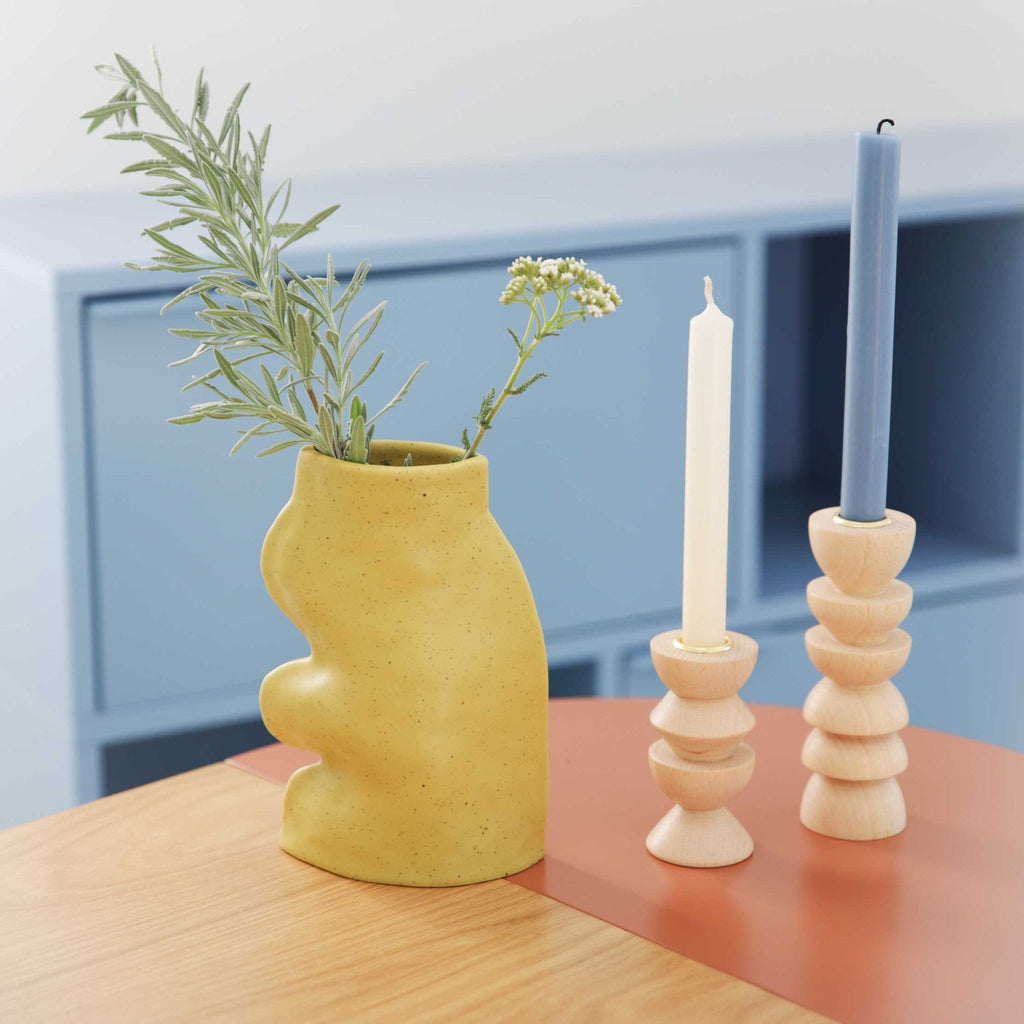 bold pistachio ceramic vase with dramatic flowing lines and a confident handmade presence