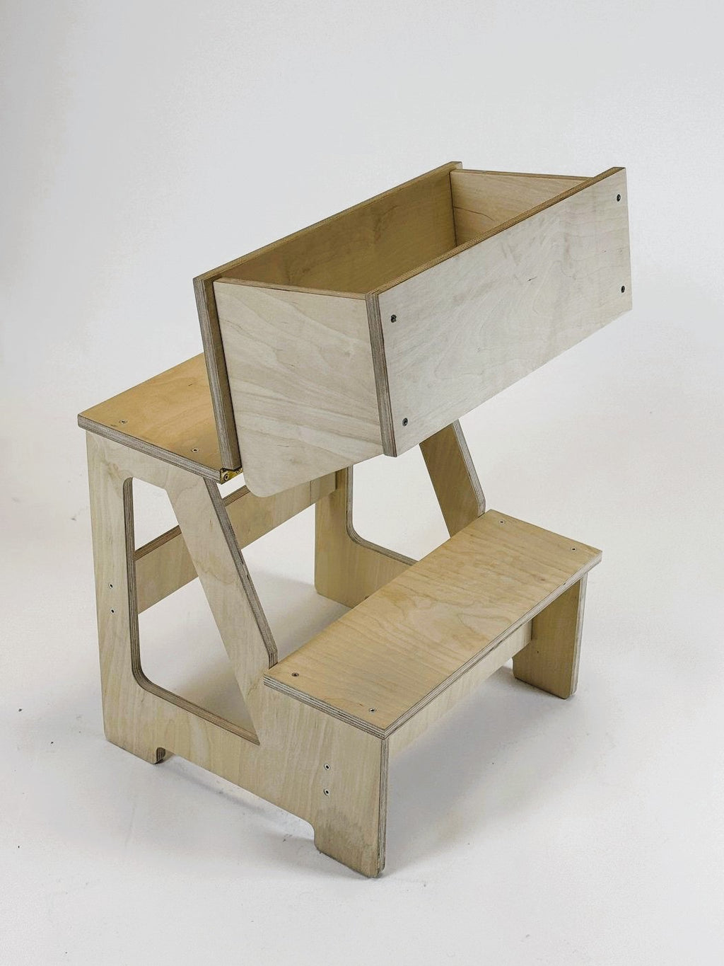 a functional folding step stool in a bright playroom setting