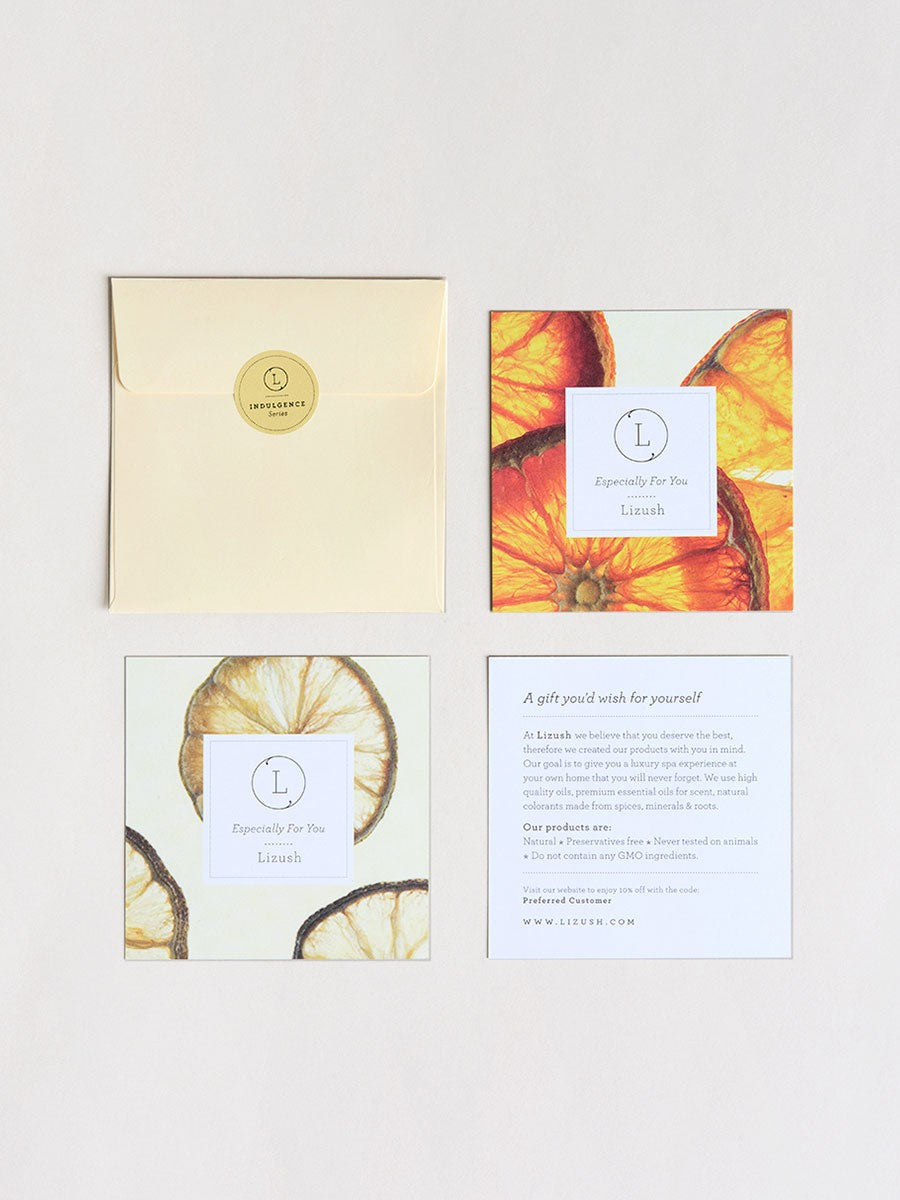 elegant gift set with shea butter cream and facial mask arranged on marble
