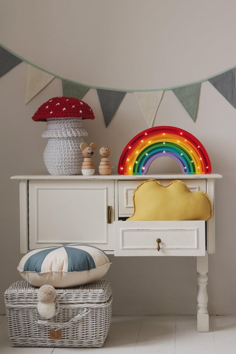 bold close-up of enchanting linen garland in cream grey teal for a magical kids room