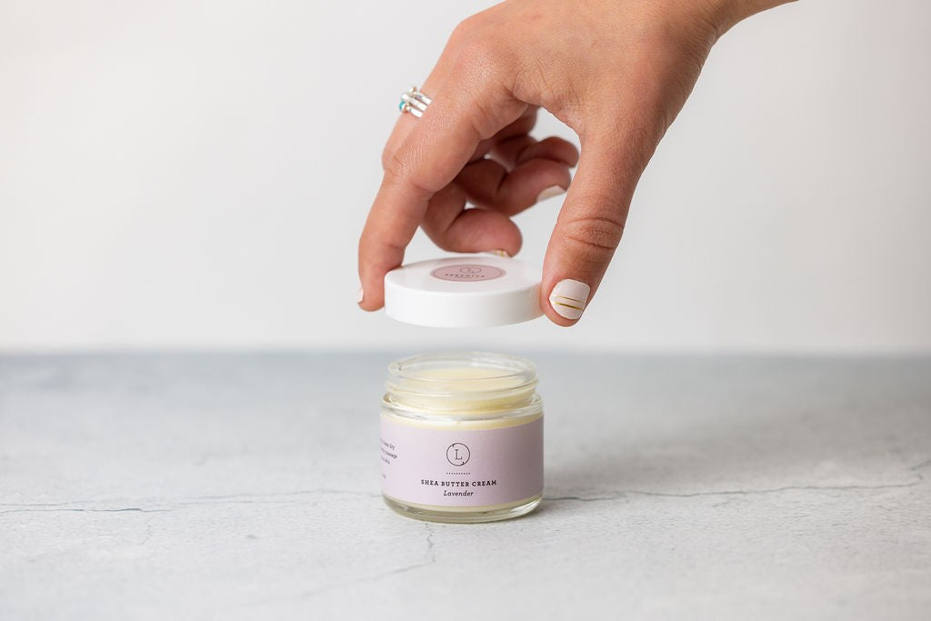 close-up of the lavender shower steamer and shea butter from the organic mom gift set