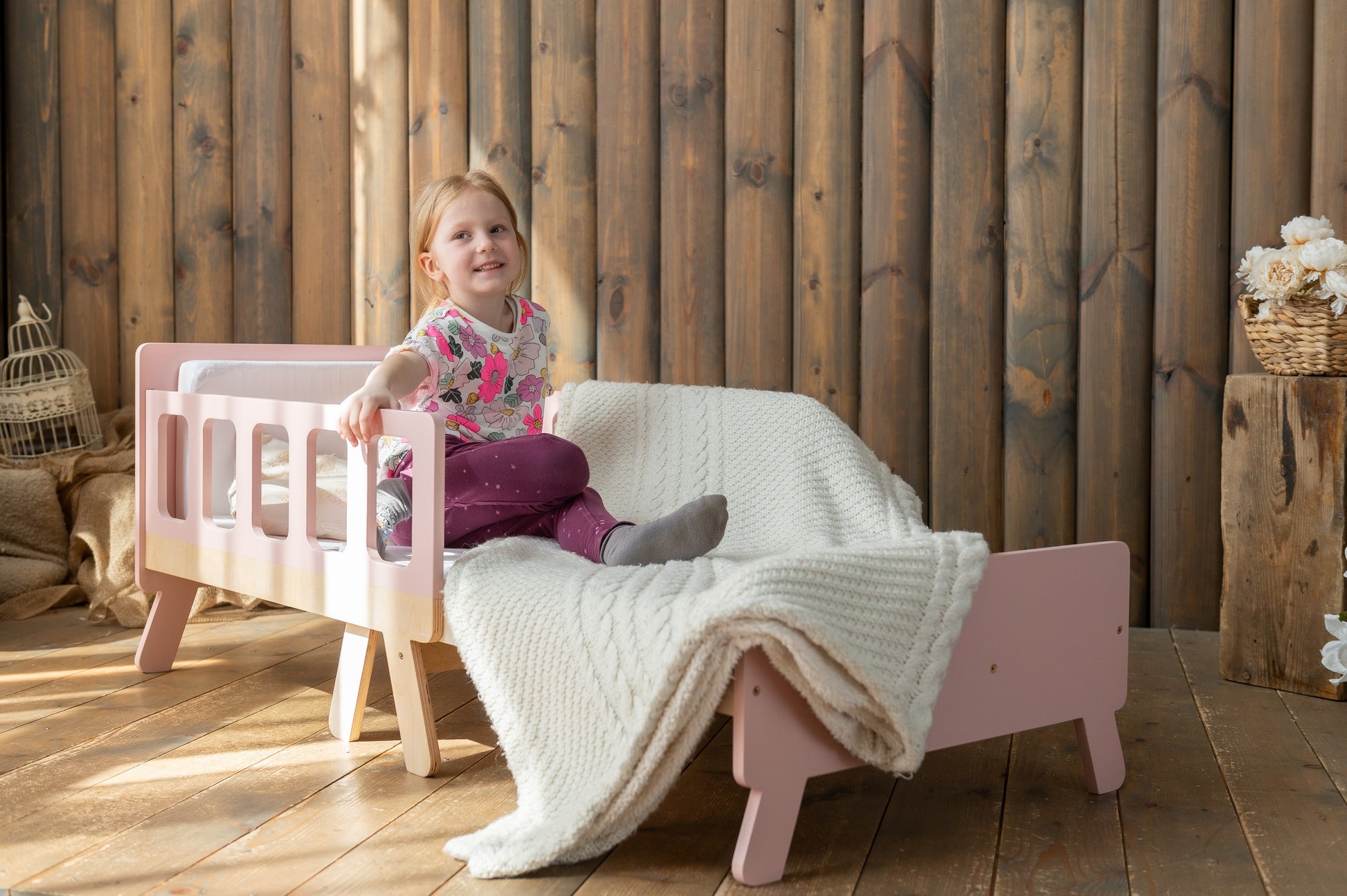 confident shot of a modern kids growing bed in a bright room, showcasing its bold and versatile design