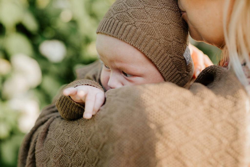 Luxurious Merino Wool Newborn Gift Set HOPE - Cable Knit Blanket and Bonnet by Wool In Love at www.brixbailey.com
