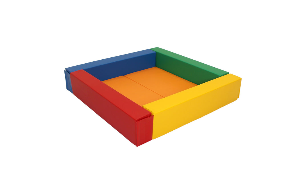 a child's hand reaching into the vibrant igloo ball pit, a perfect sensory gift for toddlers