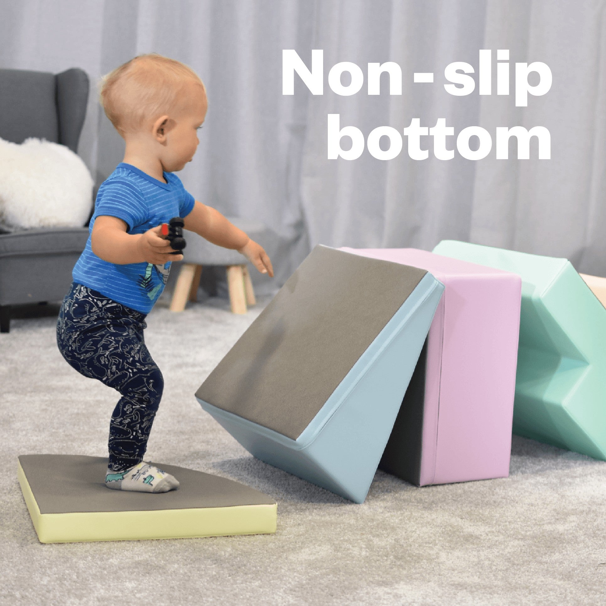 a toddler climbing a pastel foam corner climber in a sunlit playroom