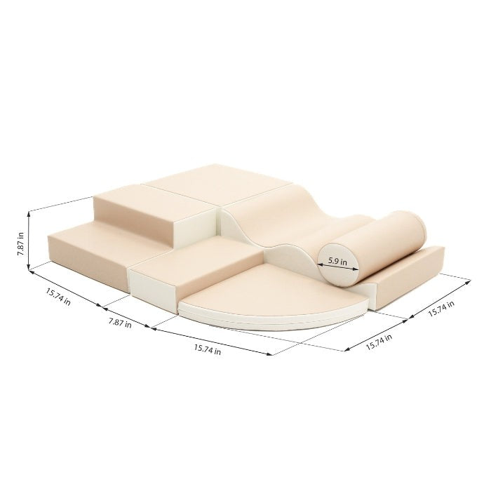 toddler laughing while stacking soft beige foam blocks in a playful fort