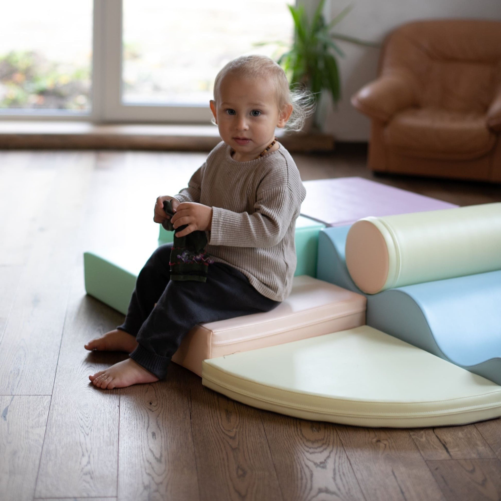 elegant pastel iglu foam blocks arranged in a sophisticated structure for creative play