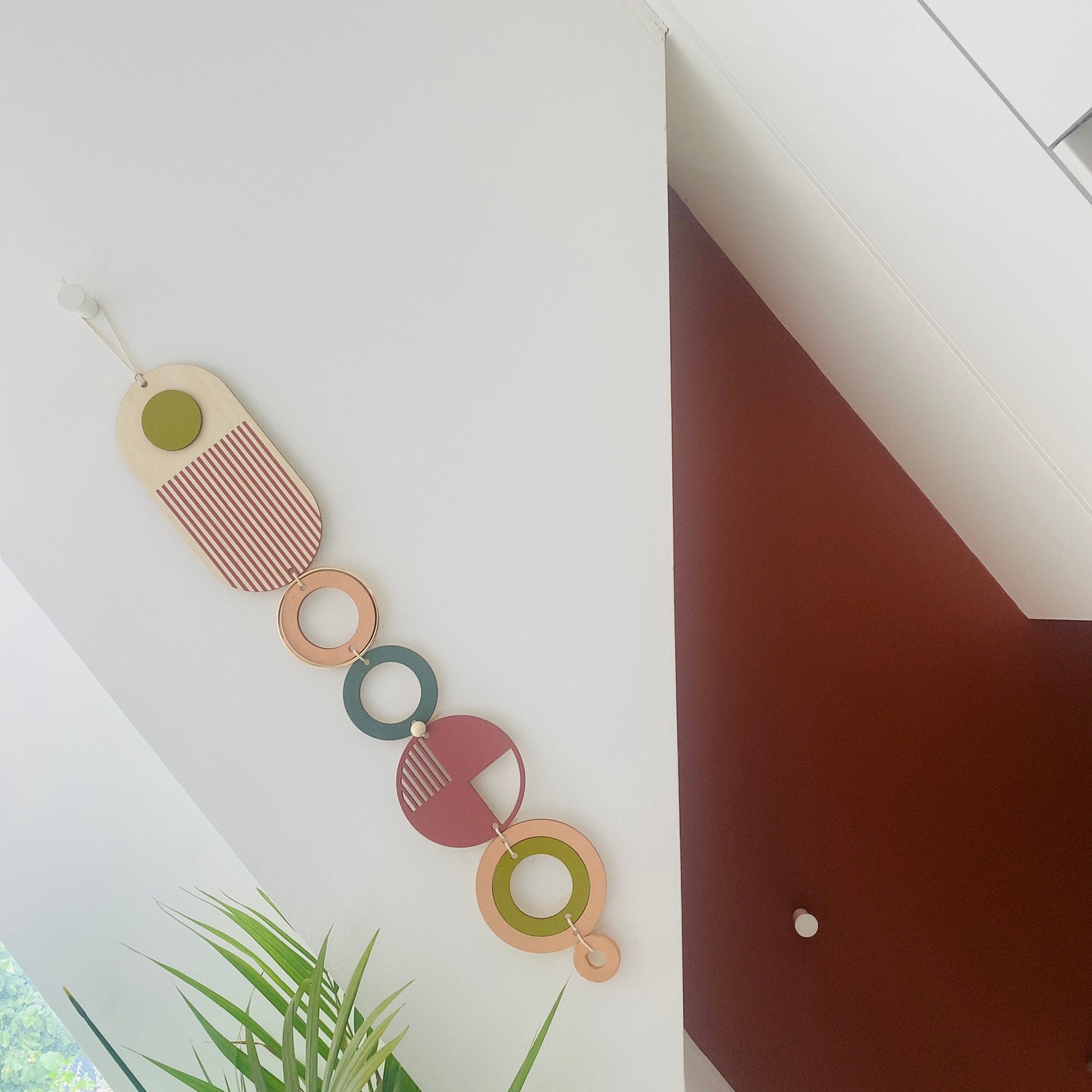 Geometric Wall Hanging in Purple, Green and Coral